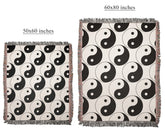 Black and white spiritual throw blanket with fringe edges