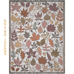 Queen size 60 x 80 “ Warm-toned fall woven blanket with cream backdrop and boho touches