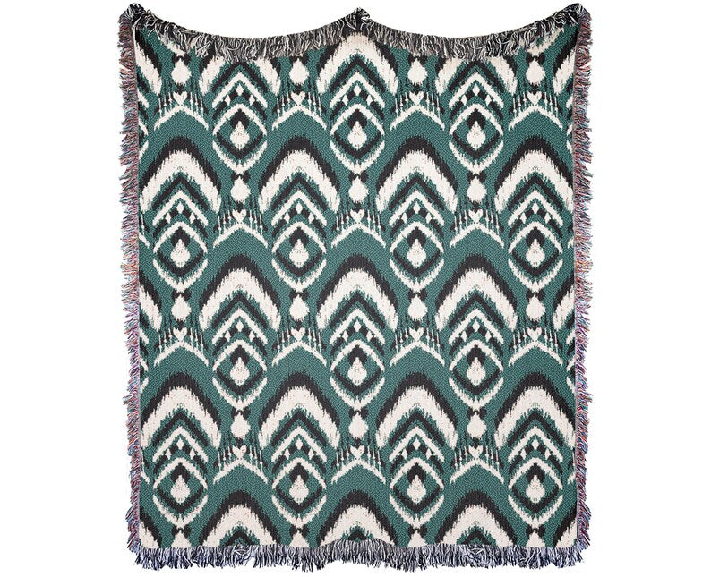 Bohemian Ikat Throw Blanket with multicolor fringed edges and vintage pattern.