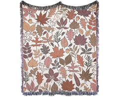 Fall Woven blanket cotton throw with fringes and warm earth tone brown fall leaf pattern