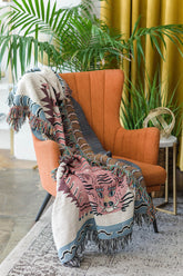 Boho living room with cozy tiger blanket