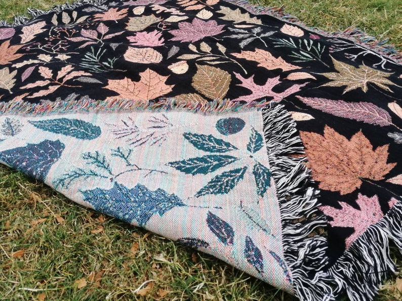 bold autumn leaves woven tapestry throw blanket featuring front and back