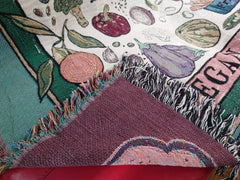 Vegan Af throw blanket laid flat showing back of the blanket