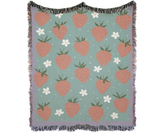 Strawberry woven blanket with pastel green background and fringe