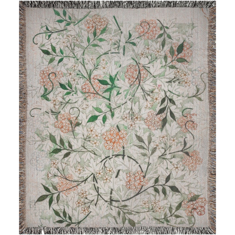 William Morris Jasmine tapestry blanket featuring floral design with multi-color fringed edges, made of 100% cotton.