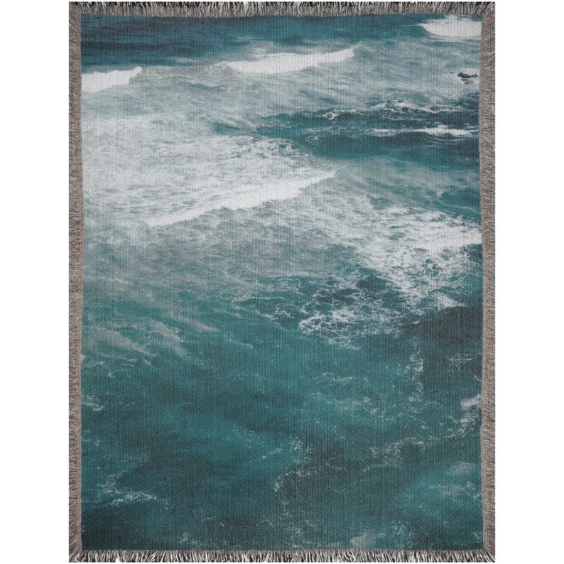 Close-up of Ocean Waves Throw Blanket woven texture – soft blue fabric detail