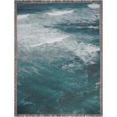 Close-up of Ocean Waves Throw Blanket woven texture – soft blue fabric detail