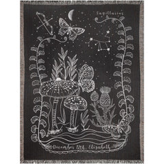 Sagittarius woven blanket featuring intricate designs, butterflies, and mushrooms, perfect gift for astrology lovers.