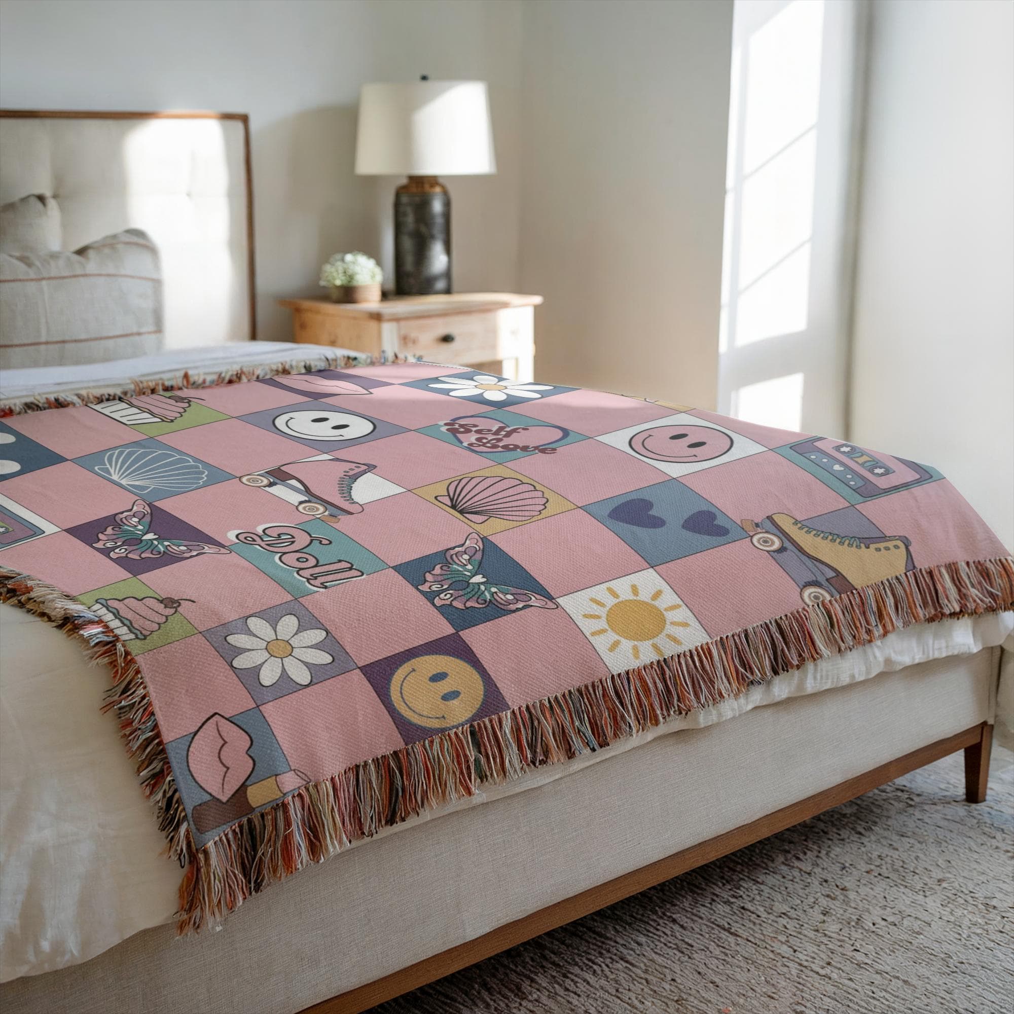 Boho dorm room decor with pastel dollcore woven blanket on bed